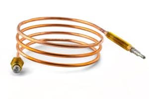 A coiled copper thermocouple, often used in water heaters to detect thermocouple signs or a bad thermocouple, with threaded metallic connectors at both ends, displayed on a white background. | High 5 Plumbing, Heating & Cooling